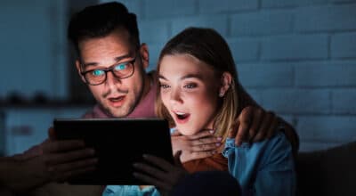 couple surfing on internet looking for spectrum bundles